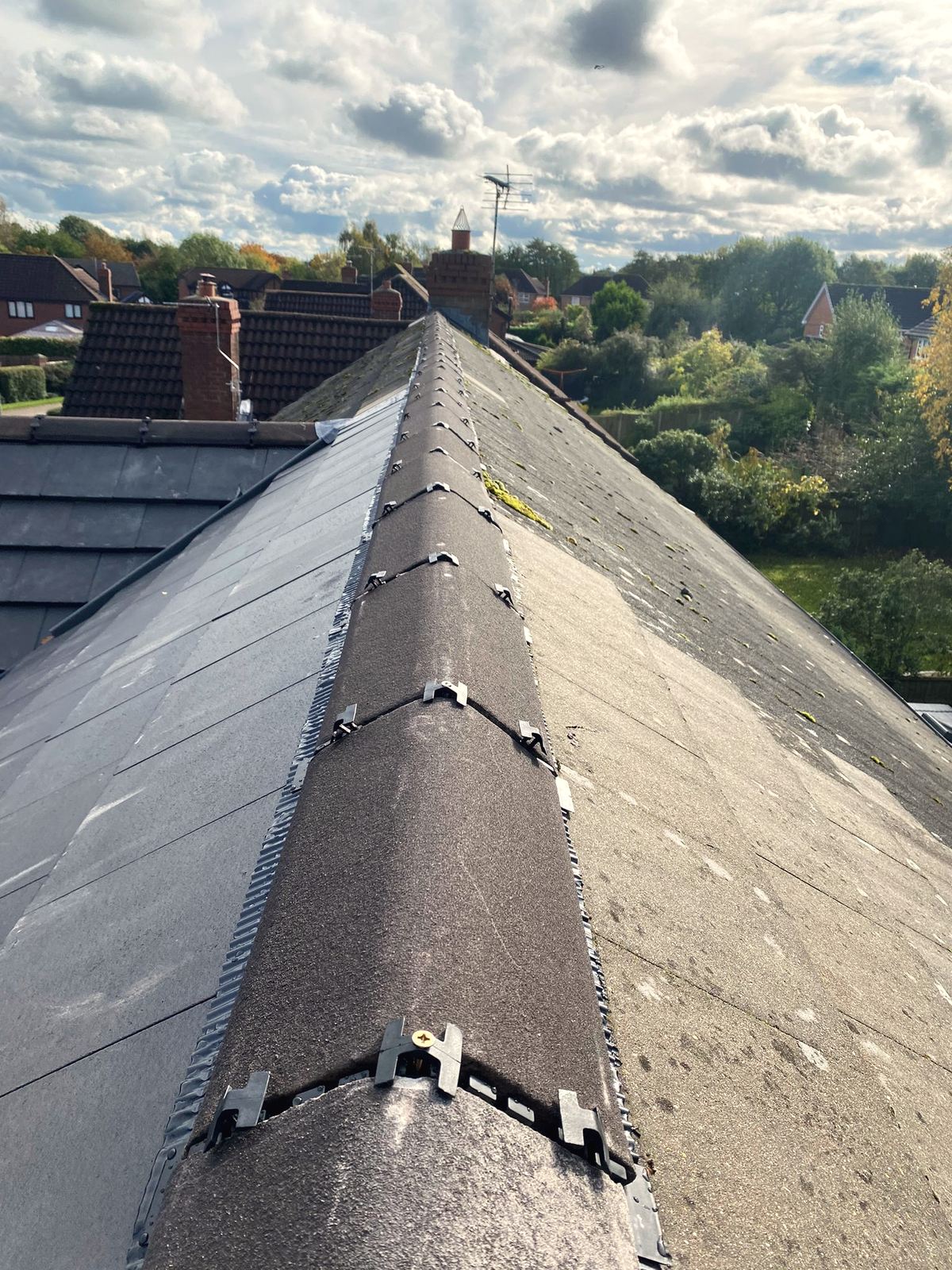 Dry ridge system being installed along the ridge