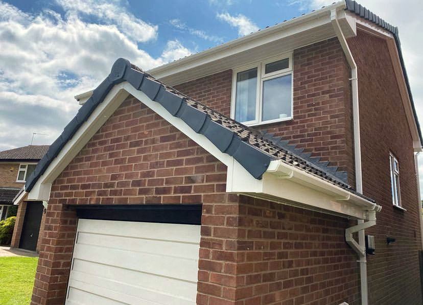 New fascias soffits and guttering above a garage door