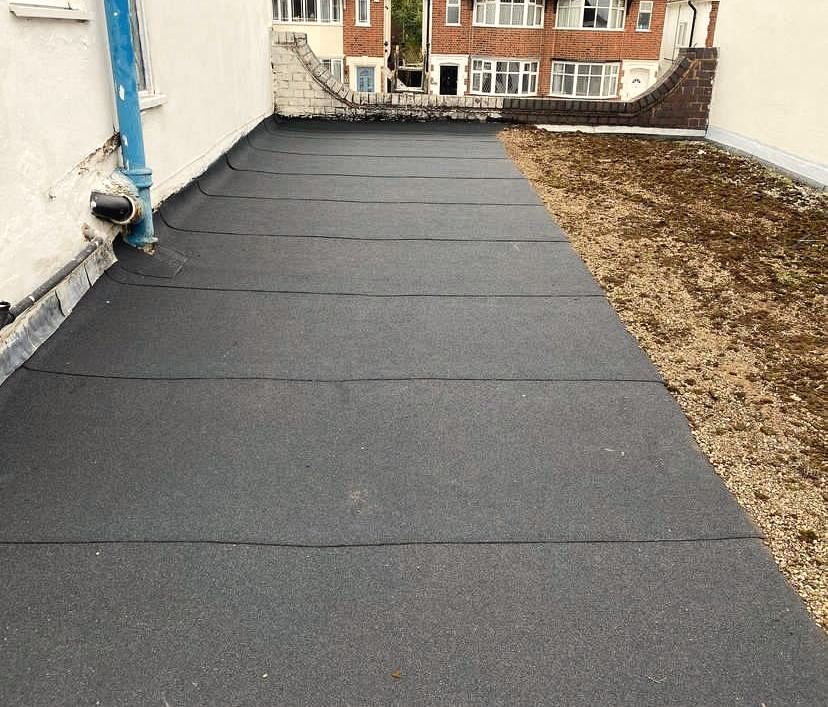 Long flat roof with neat seams and outlet