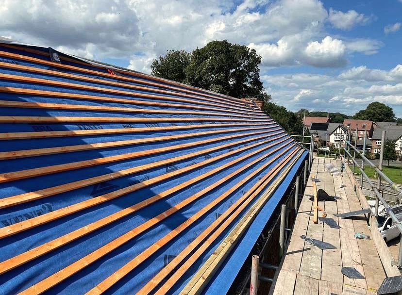 Blue breathable membrane and new battens ready for tiling